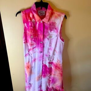 Colorful tie dyed, distressed, retro, sleeveless denim jacket with pockets.